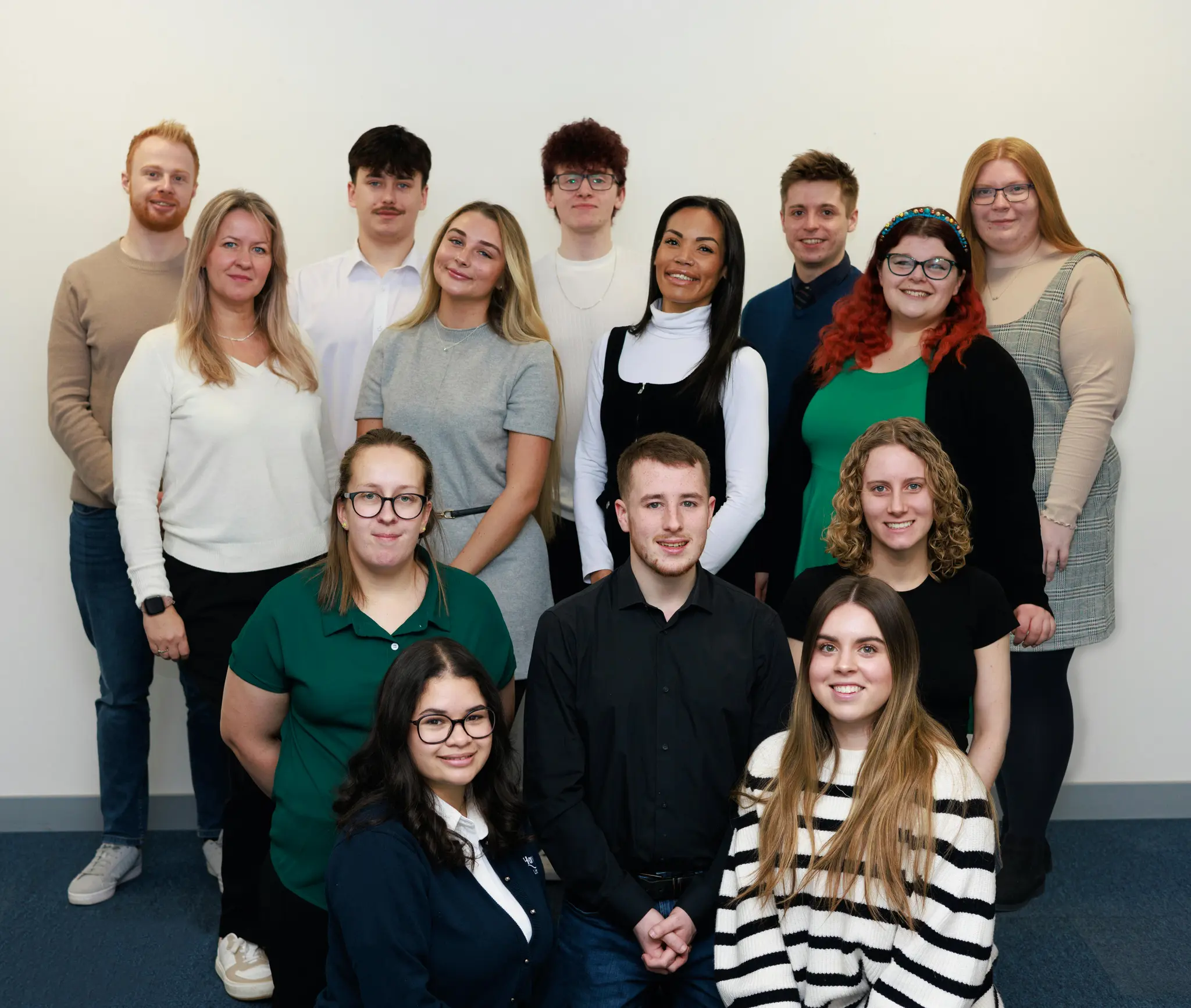 Group photo of Haven Degree learners posing together indoors.